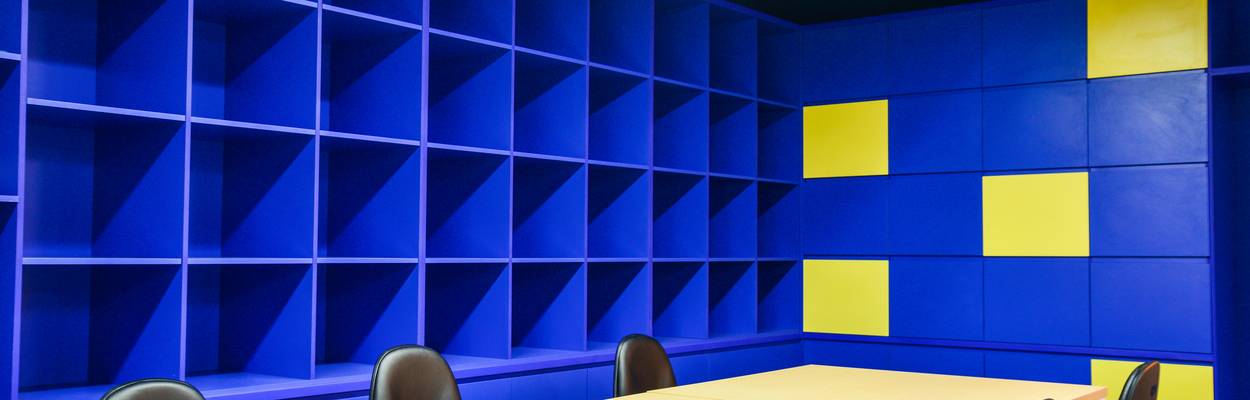 A modern server room with a blue-toned, privacy-evoking atmosphere, representing secure data storage and online privacy