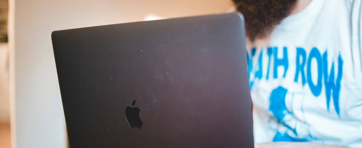 A person working securely at a laptop, symbolizing best practices for proxy use and online privacy