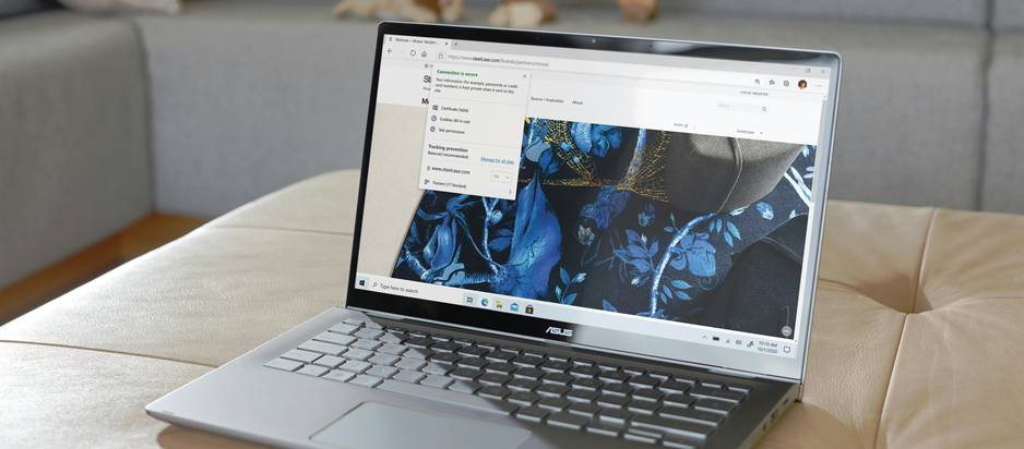 A laptop with browser settings open and a privacy/security theme