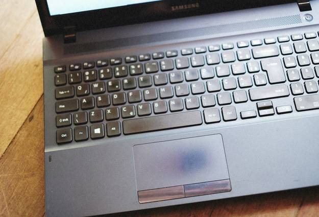 Photo of a laptop showing browser info on screen, representing user agent and privacy check