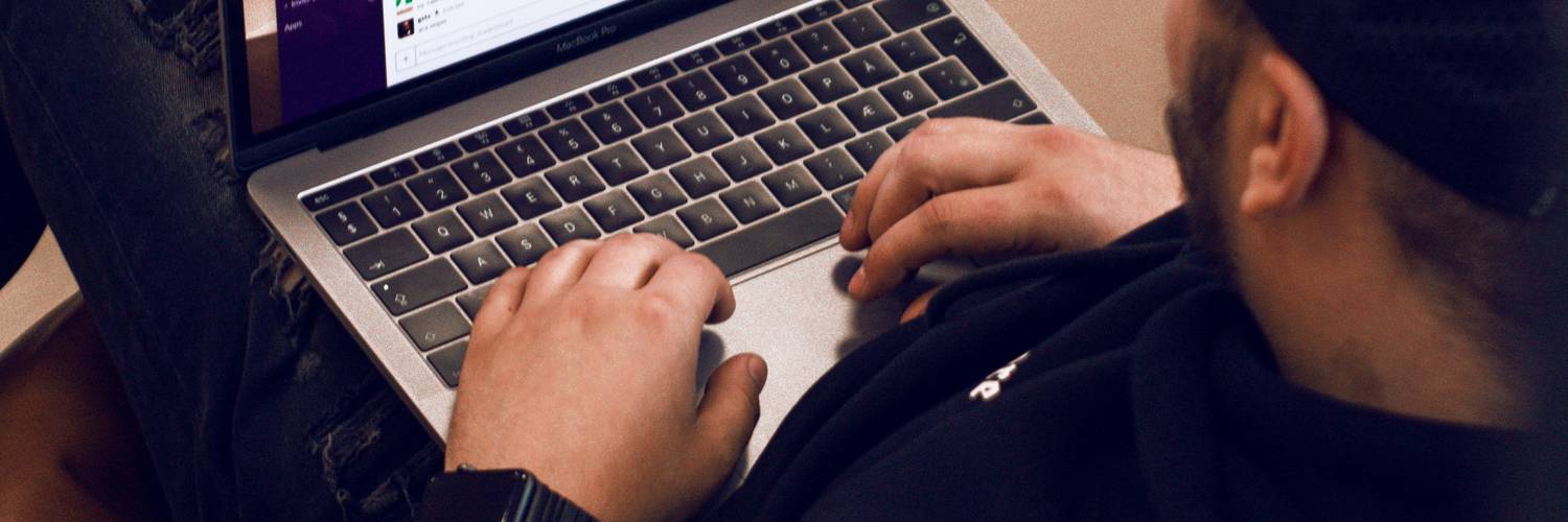 A user browsing securely on a laptop with a sense of privacy and digital security